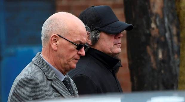 Gerry Hutch (right) at a family funeral during the gang war
